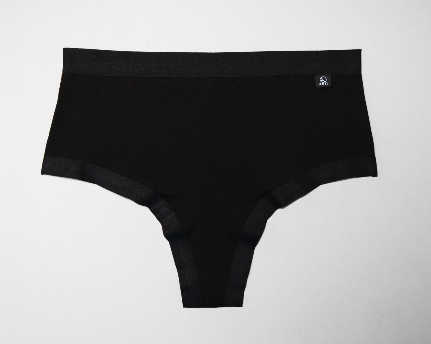 Full front view of The Bamboo Brazilian with plain elastic in the leg opening and a brand label on the right side at waist.