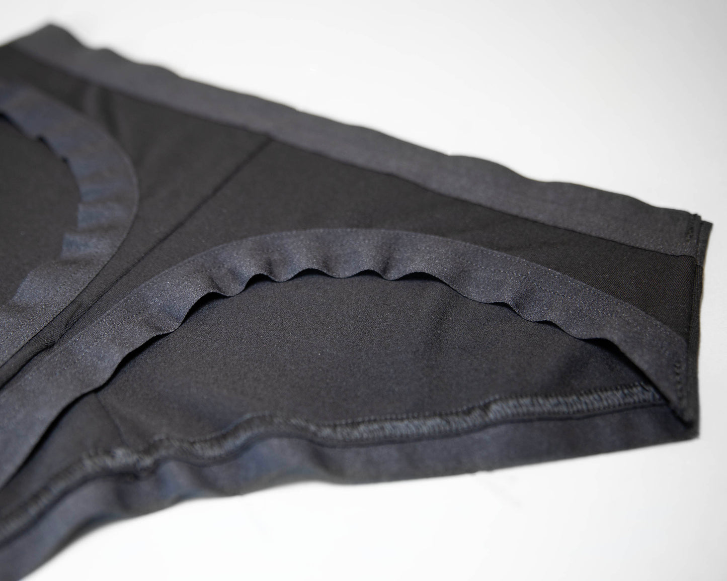 Closeup photo of The Bamboo Thong, and the curved shaped of the back legopening. 