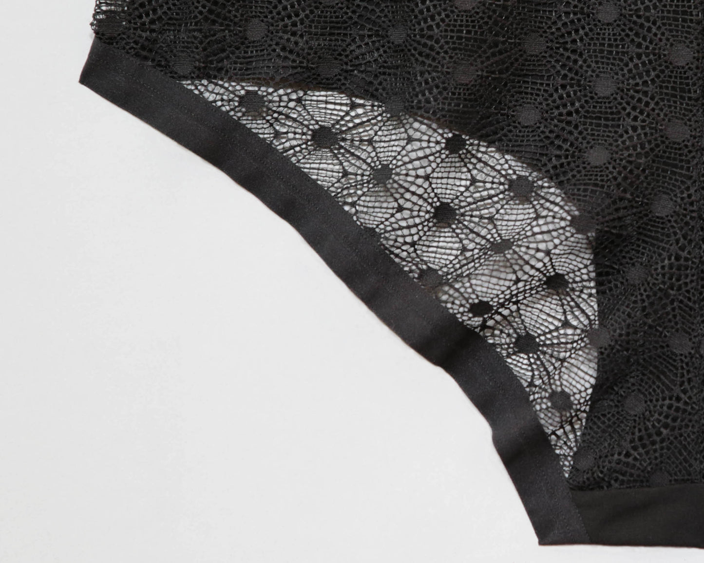 Closeup of the softer plain elastic option, against the lace on the back panel.